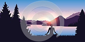 Person mediating by the river in the forest at sunrise