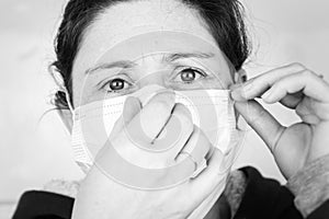 Person with medical mask for protection against flu and diseases