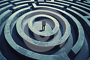 person navigating a maze or labyrinth, symbolizing problem-solving and strategy