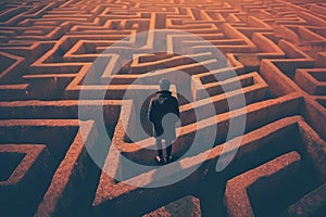 person navigating a maze or labyrinth, symbolizing problem-solving and strategy