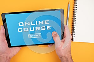 person participating in online course on tablet computer