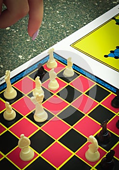 Person playing chess mind game. Leisure strategic game. People active