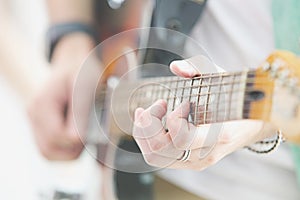 Person playing the Guitar