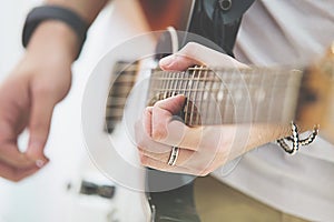 Person playing the Guitar