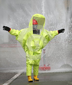 Person with protective suit against chemical and bacteriological