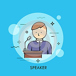 Person in purple shirt standing at lectern with microphone and speaking. Concept of speaker, chairman or lecturer giving