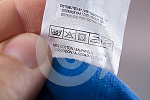 Person Reading Clothing Label