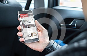 Person reading online news with mobile phone. Newspaper website mockup on smartphone screen. Man enjoying daily press service.