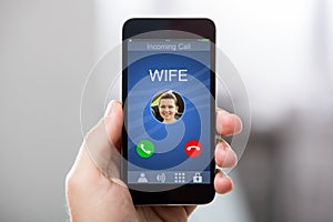 Person Receiving Wife`s Incoming Call