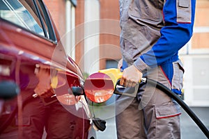 Person Refueling Car`s Tank