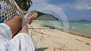 Person relaxing in a hammock