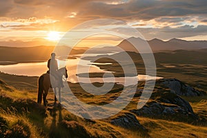 Person riding a horse in beautiful Irish landscape on dramatic sunset. Man admiring scenic view while on horseback riding tour in