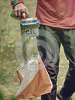 Person run to check point. Outdoor orienteering check point photo