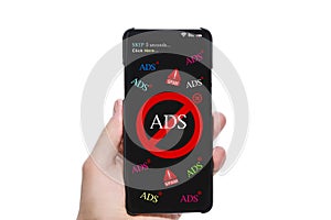 Person`s Hand Holding Mobile Phone With Screen Showing Block Ads Message Against white Background. Stop spam and annoying ad