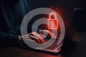 Hacker typing on laptop with glowing red padlock and digital interface on screen computer security