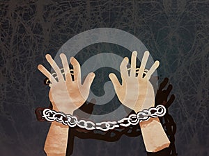 Person\'s hands in chains