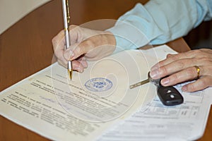 the person signing the document of purchase and sale of the car