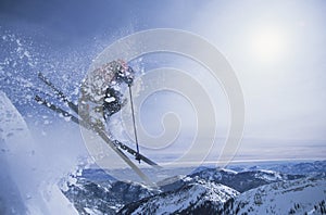 Person On Skis Jumping Over Slope photo