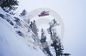 Person On Snowboard Jumping Midair