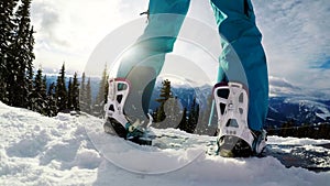 Person snowboarding on snowcapped mountain