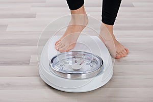 Person Standing On Weighing Scale