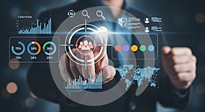 Person touching a holographic interface with data visualizations