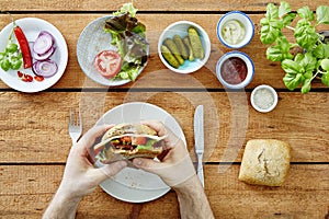 Person taking first bite out of foodie snack