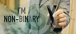 Person with X and text I am not binary, web banner