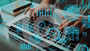 Hands Typing on Laptop with Data Visualizations and Graphs Overlaid, Representing Analysis, Technology, and Digital