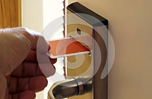 Person Unlocking Keycard Door Lock