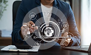 Person using computer, tablet with SDK icon on virtual screen. SDK Software development kit programming language technology