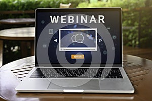 Person using a laptop computer for online training webinars. photo