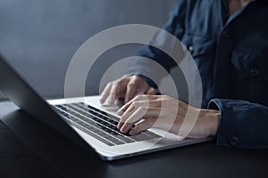 Person are using laptops, working or studying online at home. businessman using laptop work outside the office photo