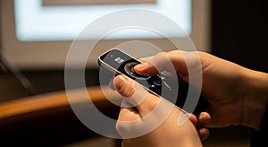 Person Using Remote Control in Front of TV