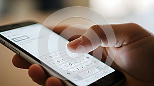 Person using smartphone with virtual keyboard interface