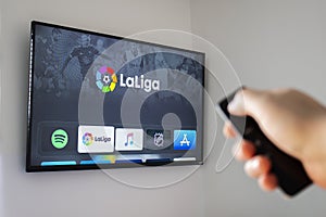 A person using the soccer, La Liga application on the Apple TV