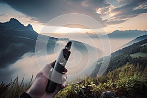 person, vaporizing and smoking device with view of breathtaking natural landscape photo