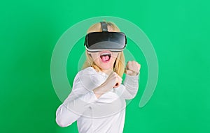 Person with virtual reality helmet isolated on green background. Woman with VR. Virtual reality experience.