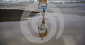 Person walking beach