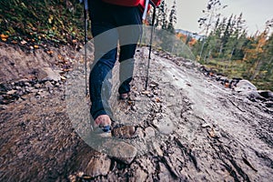 A person walking down a dirt road