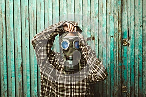 Person wearing a gas mask. Contamination concept