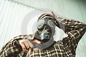 Person wearing a gas mask. Contamination concept