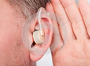 Person wearing hearing aid