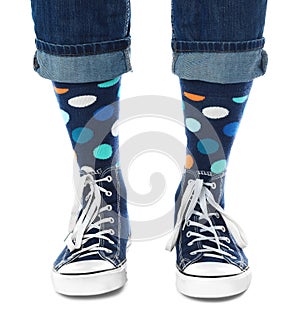 Person wearing stylish socks and shoes