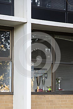 Personal Accolades and Trophies Sitting in Open Window Ledge