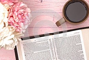 Personal Bible Study with a Cup of Coffee on a Pink Table