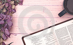 Personal Bible Study with a Cup of Coffee on a Pink Table