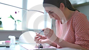 Personal Care Concept Close Up of Manicurist Applying Gel Polish at Home