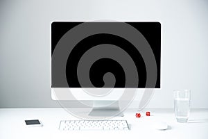 Personal computer with gadgets on the table in office