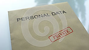 Personal data private, seal stamped on folder with important documents